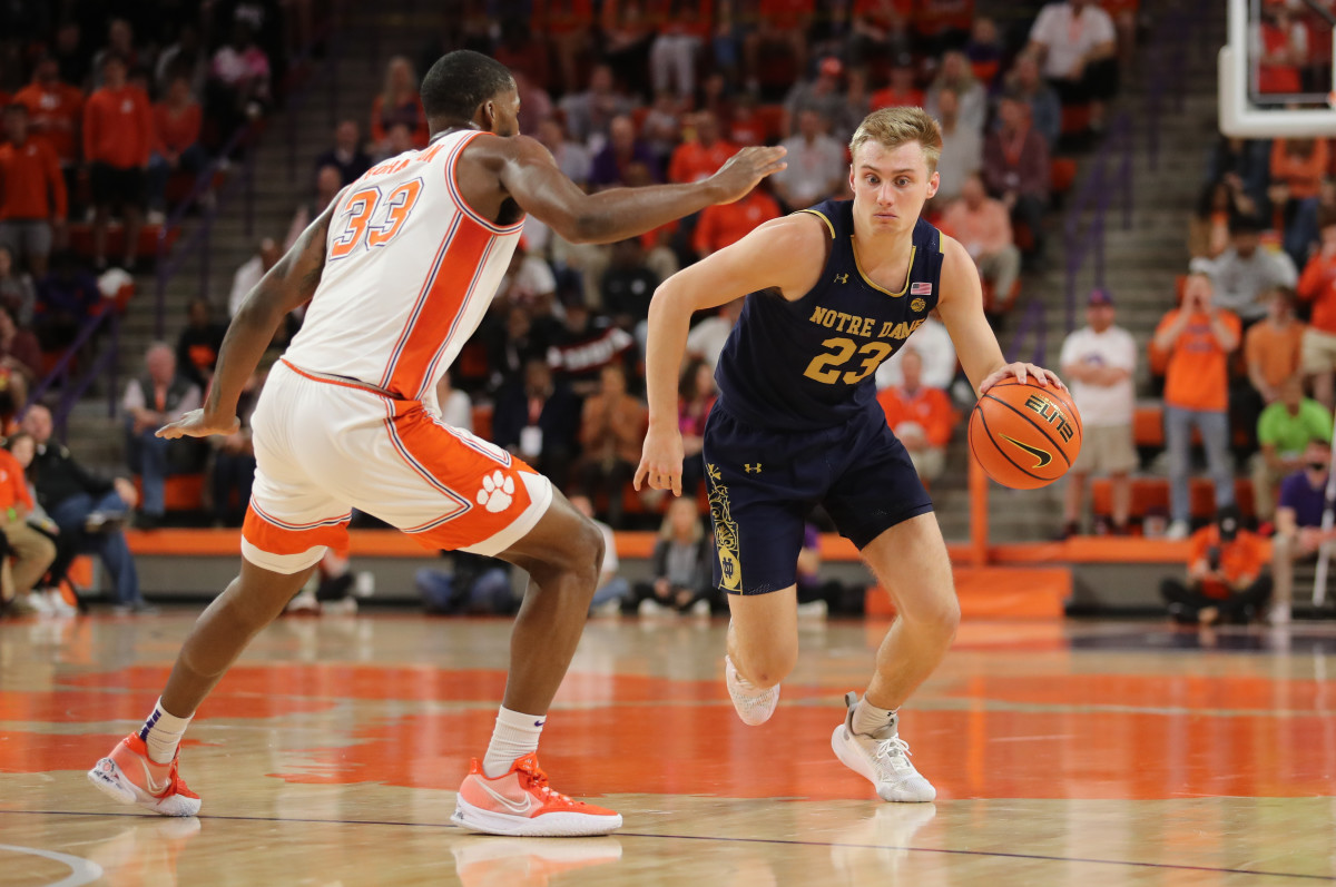 #23 Dane Goodwin attacks the basket vs Clemson